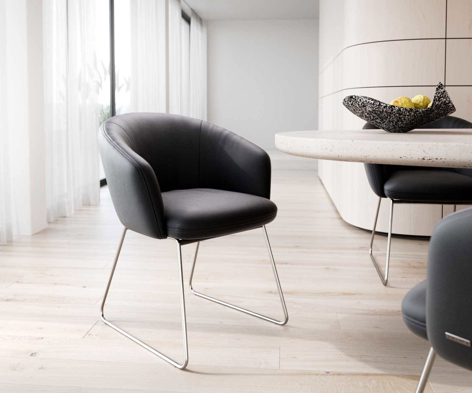 Jedálenská stolička Caja-Flex s opierkami pravá koža čierna tenká podstava nerezová oceľ vrecková pružina